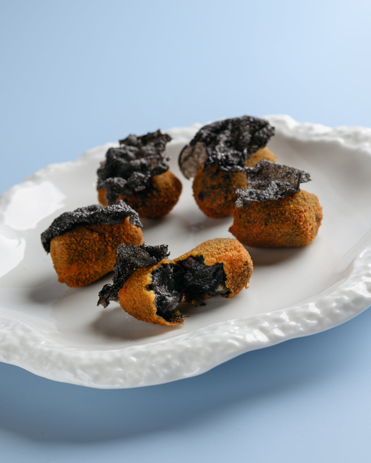Croquetas de Chipirones en su tinta | Clásicas